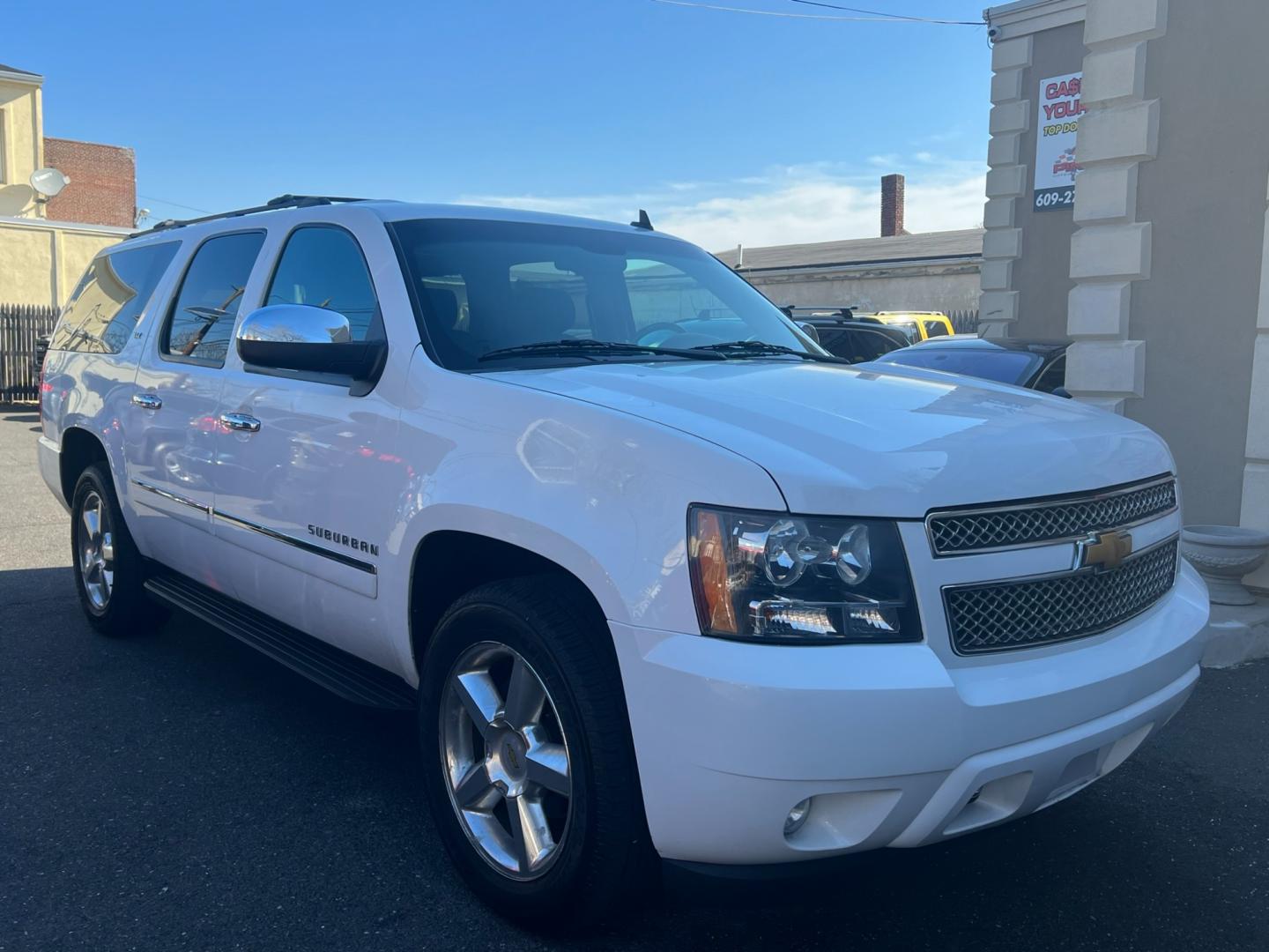 2014 White /Black Leather Chevrolet Suburban LTZ 1500 4WD (1GNSKKE77ER) with an 5.3L V8 OHV 16V FFV engine, 6 SPEED AUTOMATIC transmission, located at 1018 Brunswick Ave, Trenton, NJ, 08638, (609) 989-0900, 40.240086, -74.748085 - Photo#1